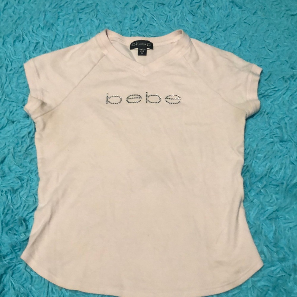A pink BEBE shirt